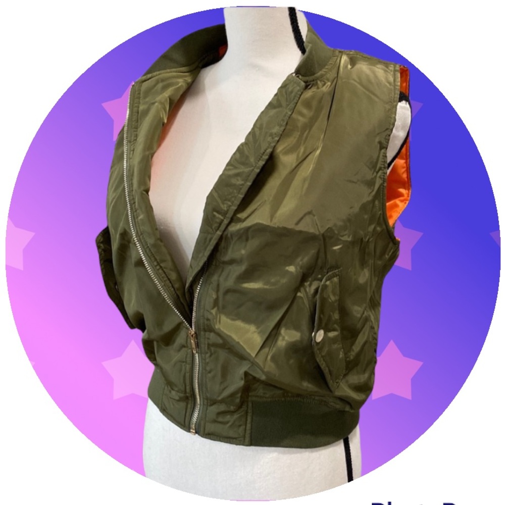Green puffy vest with pockets
